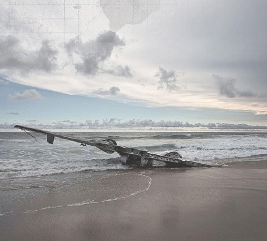 an image from Dietmar Eckhall's Happy End series of plane wreckage on a beach